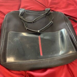 Damaged Prada carry case bag